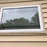 Residential Window-Tan Siding