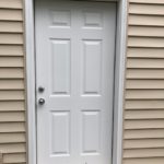White Door-Tan Siding